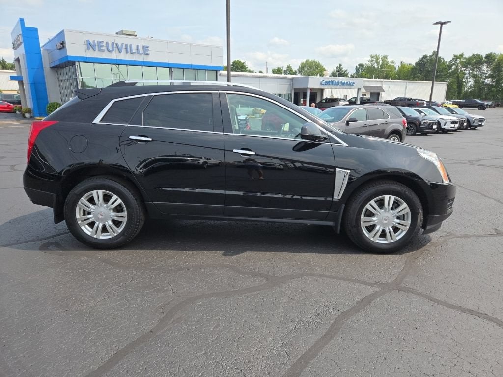 Used 2015 Cadillac SRX Luxury Collection with VIN 3GYFNBE34FS557063 for sale in Waupaca, WI